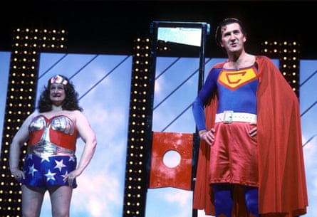 Bella Emberg dressed like Wonder Woman and Russ Abbot dressed like Superman with a ‘C’ on his costume.
