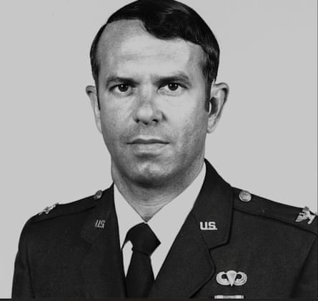 A black and white portrait of him in US air force uniform