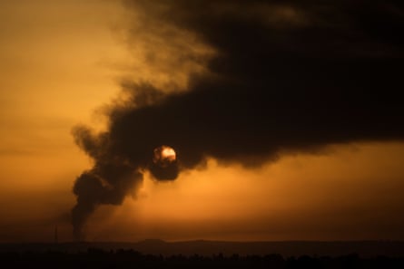 Smoke rises over the Gaza Strip, as seen from from the Israeli side of the border