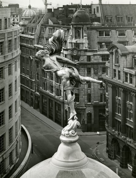 Bronze sculpture of Ariel on the top of a dome, London