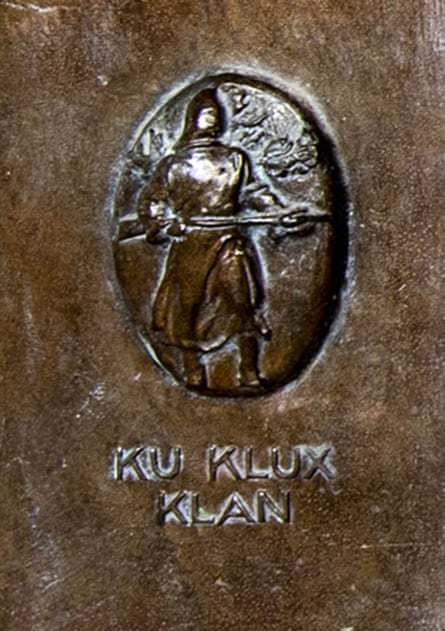 A detail from the lower left-hand corner of a panel at West Point shows an armed man in a hood, with Ku Klux Klan written below.