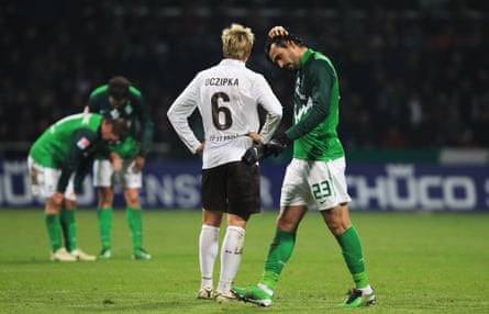 Hugo Almeida of Bremen processes his red card against Werder Bremen.