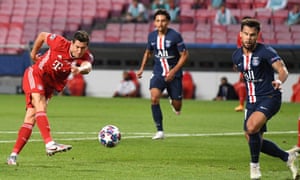 Robert Lewandowski of Bayern takes a shot which hits the post.