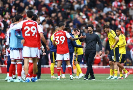 Arsenal manager Mikel Arteta and match winning goalscorer Bruno Guimaraes celebrate after the final whistle.