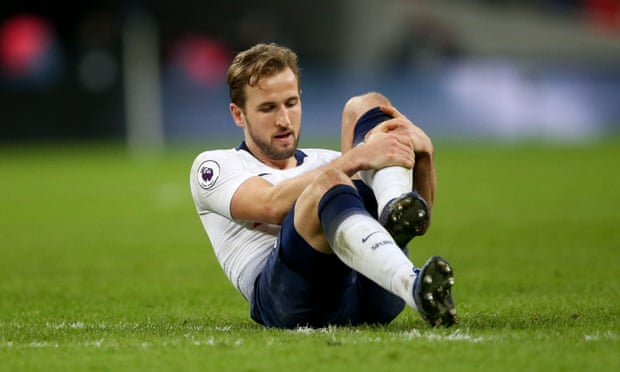 Harry Kane nurses his ankle after the final whistle of Tottenham’s 1-0 defeat to Manchester United on Sunday.