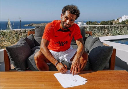 Mohamed Salah signing his new contract last year. It runs to 2025.
