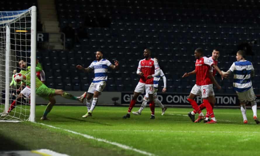 Lyndon Dykes of QPR (second right) scores the equalising goal 1-1.