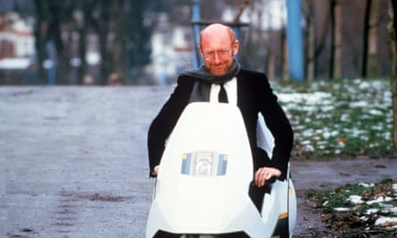 Sir Clive Sinclair on his Sinclair C5 vehicle.
