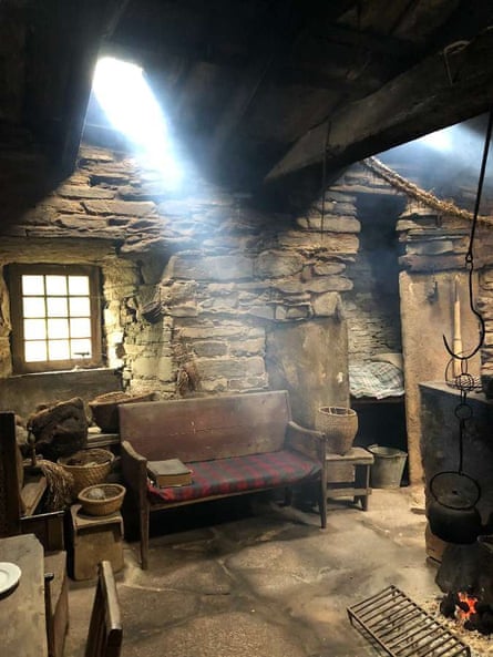 Old Orkney dwellings, such as this one at Kirbuster Farm, had openings in their roofs to allow peat smoke to escape.