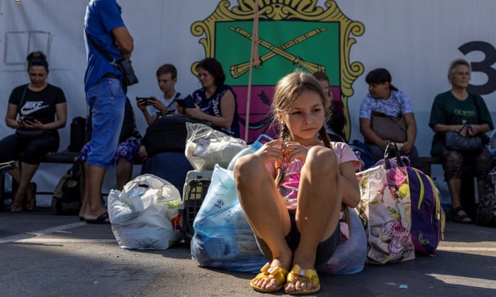 Russia-Ukraine war live: Ukrainian troops begin counter-offensive in south, says military command | Ukraine 5 Anastasija Maksimova rests as she waits with her family to be transferred to other parts of the country, in Zaporizhzhia.