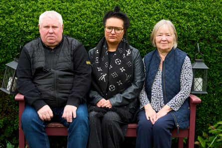 Harvey Willgoose’s parents Mark and Caroline and nan Maria Turner sat together on a bench