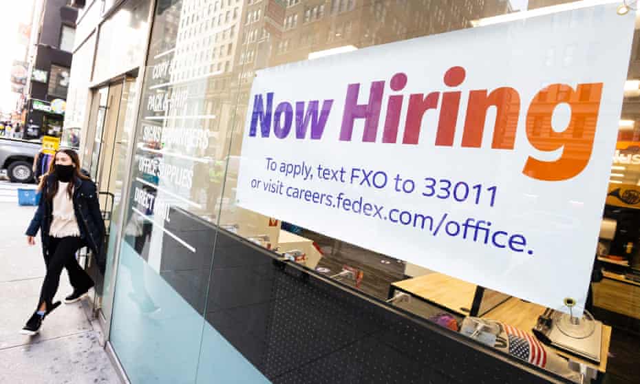 A sign advertising job openings is seen in a store window in New York this week.