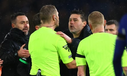 Mauricio Pochettino remonstrates with the referee Craig Pawson as Brighton’s Roberto De Zerbi (left) looks on.