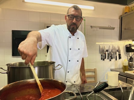 Sous-chef Luigi Randazzo at work at a restaurant kitchen in Sutera, Sicily.
