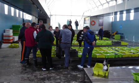 People at the fish market in Fisterra 