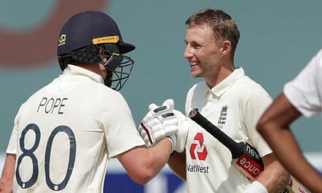Ollie Pope congratulates Joe Root on the England captain reaching his double century in the first Test against India in Chennai