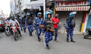 Indian troops patrol the streets of the city of Jammu, in Kashmir, on Friday.