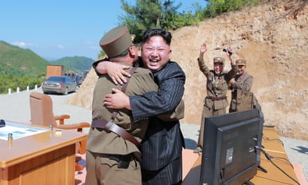 Kim Jong-un reacts after a test launch in July