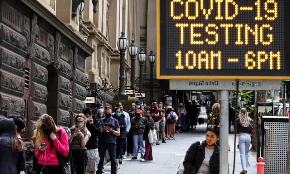  People queue outside Melbourne Town Hall Covid-19 testing centre on December 22, 2021 in Melbourne, Australia. 