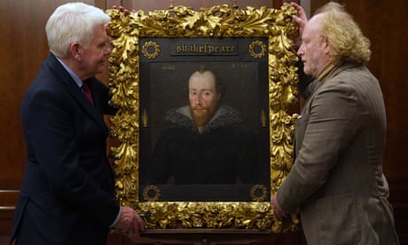 The portrait is unveiled by conservator Adrian Phippen (right) and Art and Antiques writer Duncan Phillips.