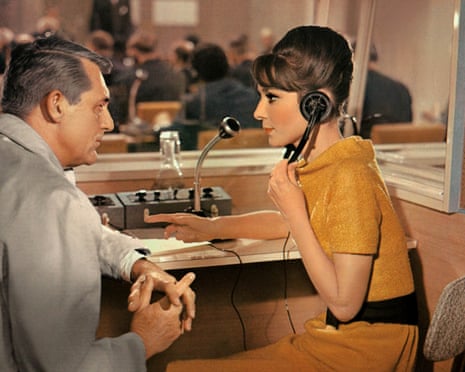 Cary Grant and Audrey Hepburn in a scene from the 1963 romcom and spy film Charade