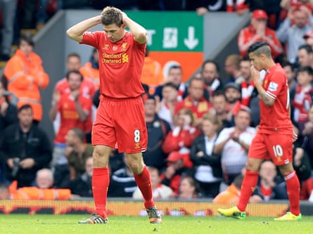 Liverpool’s Steven Gerrard (left) puts his hands on his head after his mistake against Chelsea in 2014.