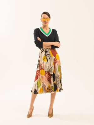 black jumper with green and white stripes on the v-neck section asos.com yellow green brown black cream floral patterned pleated skirt zara.com orange frame and lens sunglasses Chimi from brownsfashion.com animal print stiletto shoes dunelondon.com