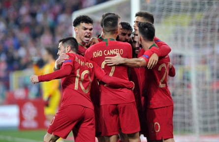 Portugal’s players celebrate André Silva’s goal which put them on their way to victory against Poland, even without Cristiano Ronaldo.