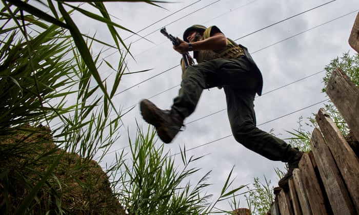 A serviceman of a Ukrainian National Guard unit takes part in training at their position in the Kharkiv area of Ukraine.