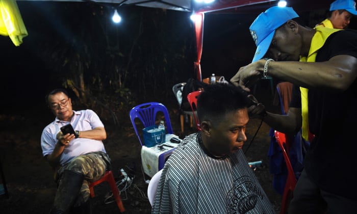 A man gets a free haircut at the command centre
