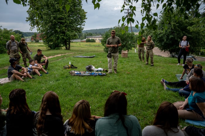 Volunteers from Lviv oblast teach first aid techniques outside of Kharkiv.