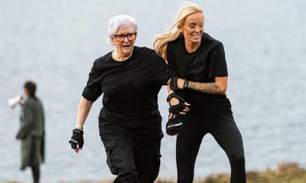 Linda and Leanne in black, arm in arm