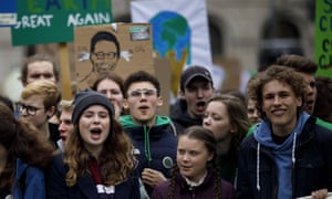 young people protesting with banners