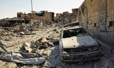 Airstrikes have levelled parts of the city and cars have been reduced to skeletons.