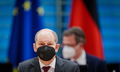 Covid live: Poland, Slovakia and Iceland latest countries set to end most coronavirus restrictions — as it happened 3 German Chancellor Olaf Scholz wears a protective face mask as he attends the weekly cabinet meeting at the Chancellery in Berlin, Germany, on 16 February.