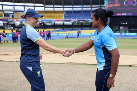 Australian captain Alyssa Healy and Sri Lanka’s captain Chamari Athapaththu shake hands as they inspect the wicket prior to the match