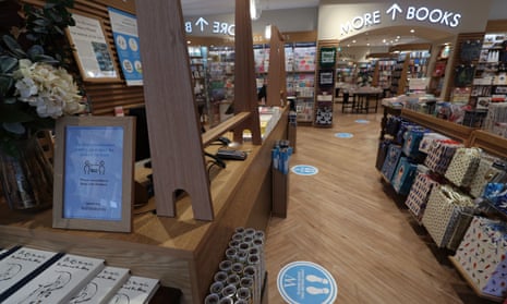 plexiglass screens behind tills to protect staff are installed in a London branch of Waterstones, ahead of its reopening on June 15. 