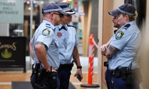 Police guard the lobby of the Australian Workers’ Union Sydney headquarters after the 2017 raid by Australian federal police