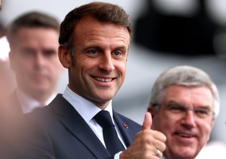 French President Emmanuel Macron with IOC president Thomas Bach in the background.
