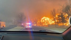 Forest fires seen from a police car in Superior, Colorado