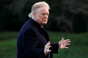 Donald Trump walks across the South Lawn as he returns from North Carolina on February 7, 2020.