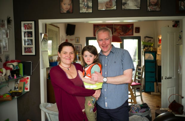 Rosie Woods with her husband, Martin Donohue, and daughter.