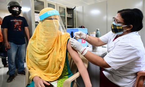 A nurse administers a Covid-19 vaccine Prayagraj, Uttar Pradesh.