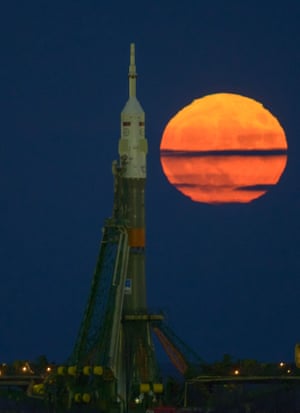 The supermoon rises behind the Soyuz rocket at the Baikonur Cosmodrome launch pad in Kazakhstan, Monday, Nov. 14, 2016. NASA astronaut Peggy Whitson, Russian cosmonaut Oleg Novitskiy of Roscosmos, and ESA astronaut Thomas Pesquet will launch from the Baikonur Cosmodrome in Kazakhstan the morning of November 18 (Kazakh time.) All three will spend approximately six months on the orbital complex. A supermoon occurs when the moon’s orbit is closest (perigee) to Earth. Photo Credit: (NASA/Bill Ingalls)