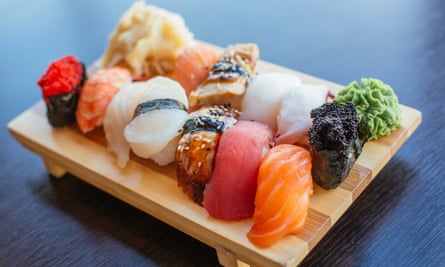 Close-up of sushi set on wooden board