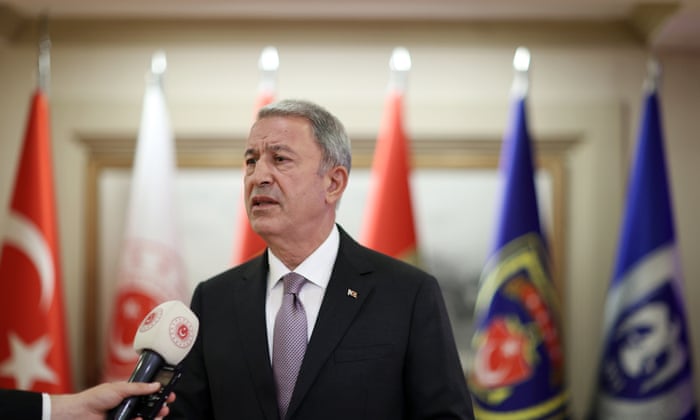 A handout photo made available by the Turkish Defence Ministry press office shows, Turkish Defence Minister Hulusi Akar speaks after the Turkish, Russian, Ukrainian and UN diplomats meeting for grain talks in Istanbul, Turkey, 13 July 2022.