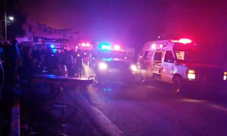 Emergency personnel arrive in Tlahuelilpan, Hidalgo, Mexico.