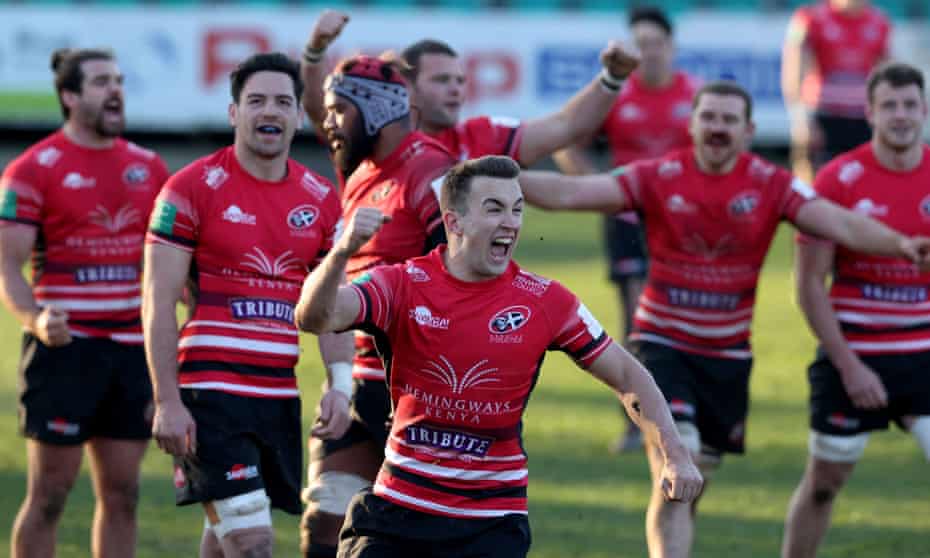Cornish Pirates players celebrate a famous win against Saracens