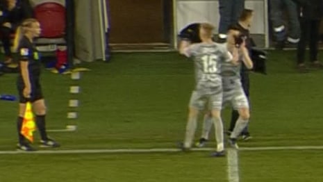 Substitute poked in eye by teammate in touchline high five, then goes off injured – video