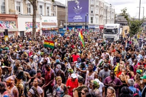 Revellers process down the carnival route
